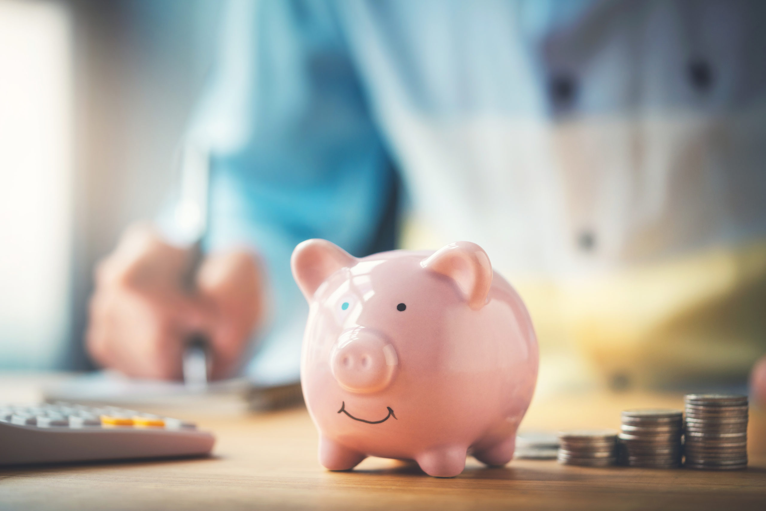 Businessman with a piggy bank